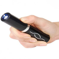 Load image into Gallery viewer, Stun Master 25,000,000 Volt Rechargeable Lipstick Stun Gun with Flashlight
